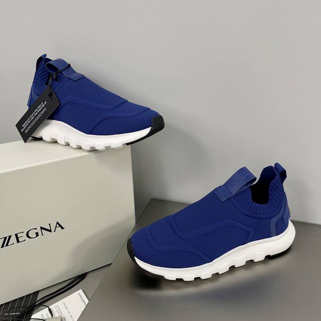 编码： Zegna 杰尼亚 新款男士techmerino 套袜式鞋口套穿运动鞋 这款techmerino 套袜式鞋口套穿运动鞋结合巧妙的针织设计，无需多余鞋带，